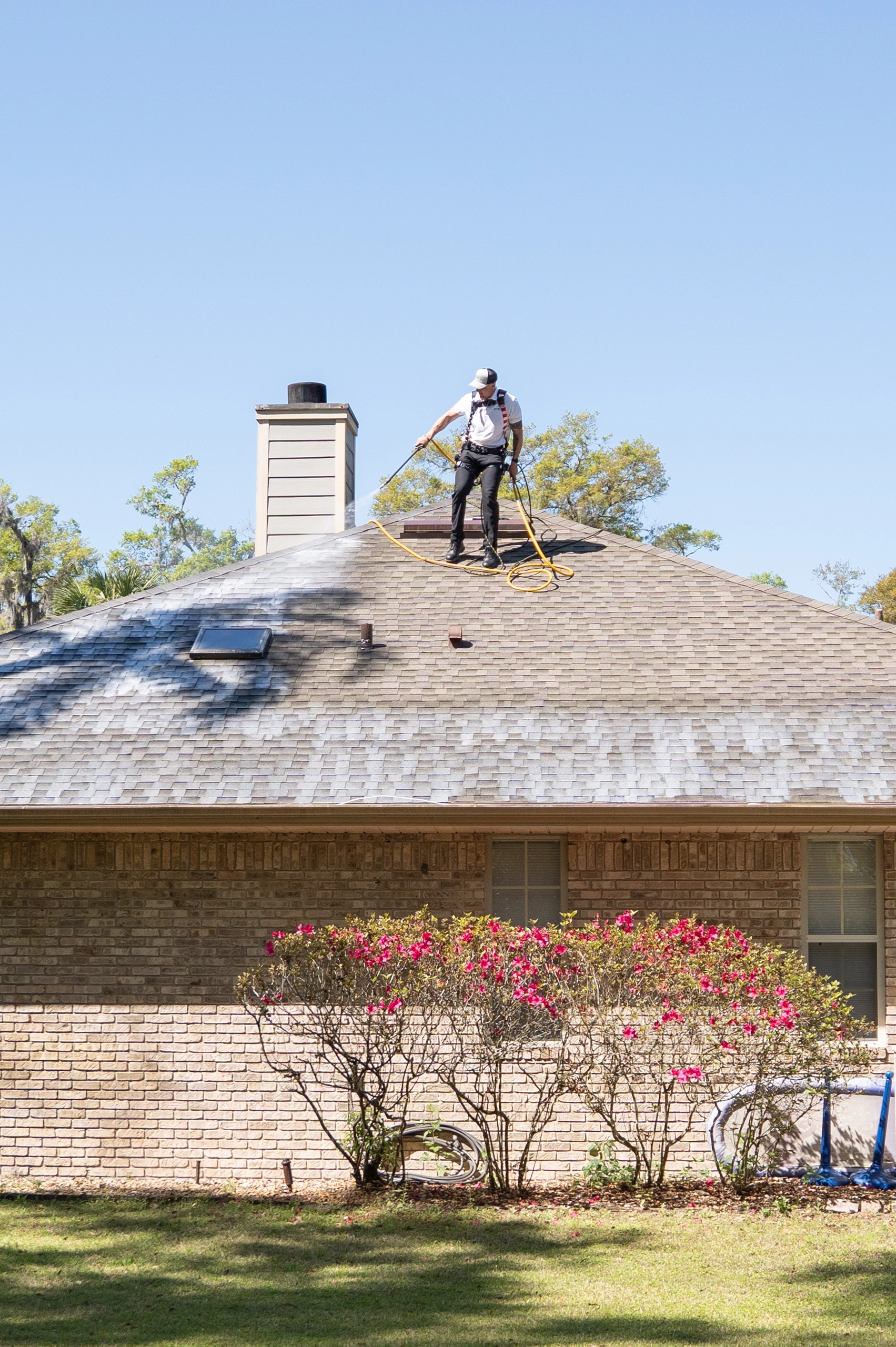 roof maxx being applied on a roof