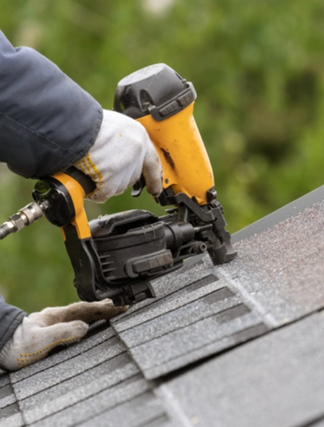 nail gun on a roof